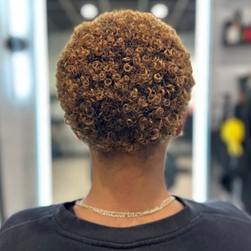 Tapered curl cut, shaped and defined